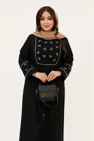 مانتو بیلر پیله‌دار زنانه با طراحی شیک و یقه‌دار، مناسب استایل روزمره و نیمه‌رسمی