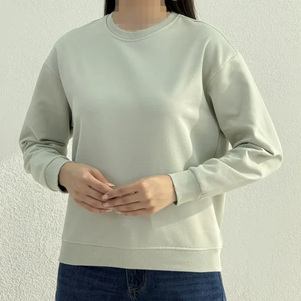 بلوز دورس زنانه دونخ مینیمال رنگ سبز پاستلی روشن تن مدل شیکدونیا کد 1016387